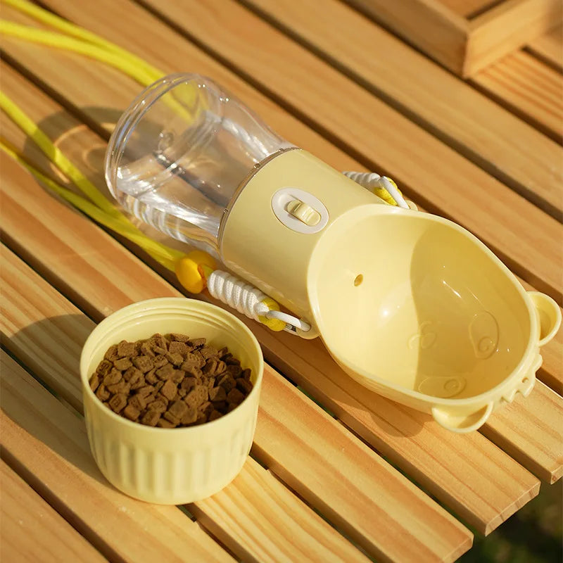 Yellow pet water bottle and food container on a wooden surface